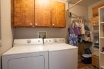 Laundry room with full-sized washer and dryer
